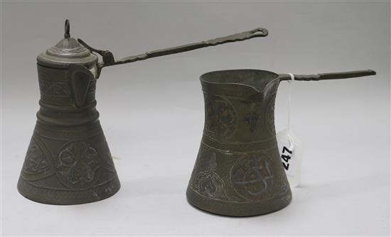An Oriental brass coffee pot and milk pot